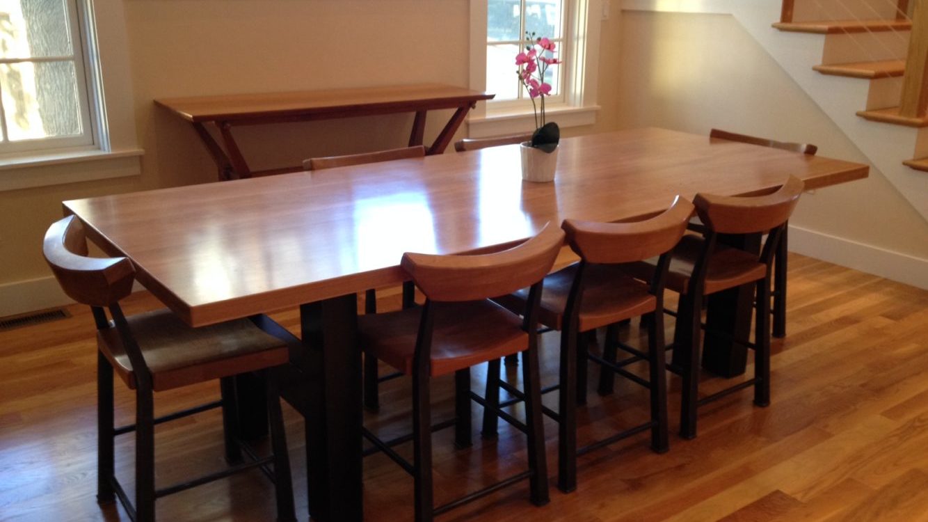 Cherry and steel residential dining table set.